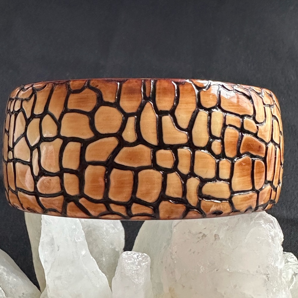 Resin EUC bangle in pebbled design. Unique, textured outer, deep maroon inside